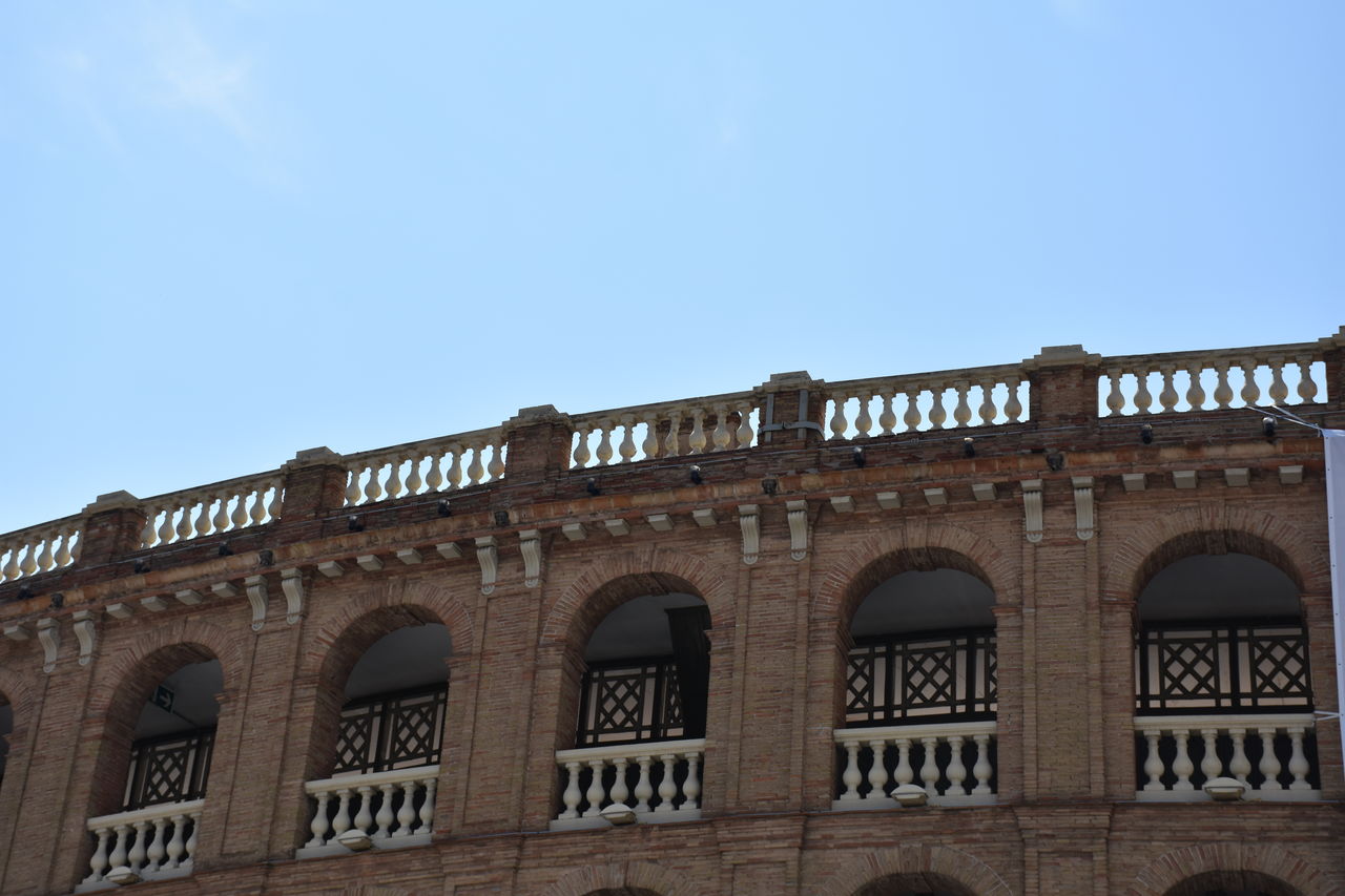Low angle view of plaza de toros de valencia against sky