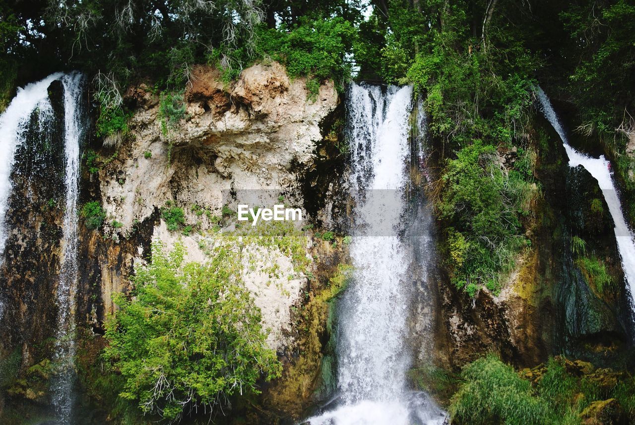 Scenic view of waterfalls in park