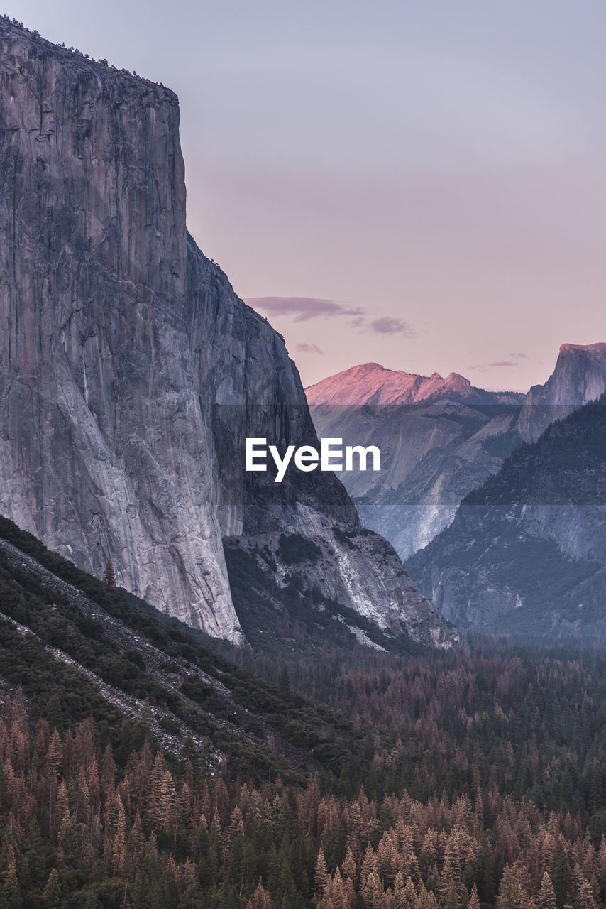 Scenic view of rocky mountains against sky