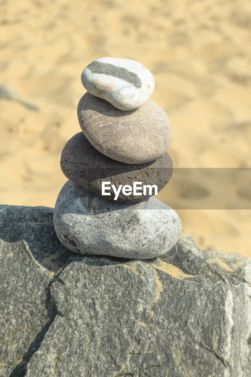 STACK OF STONES ON ROCK