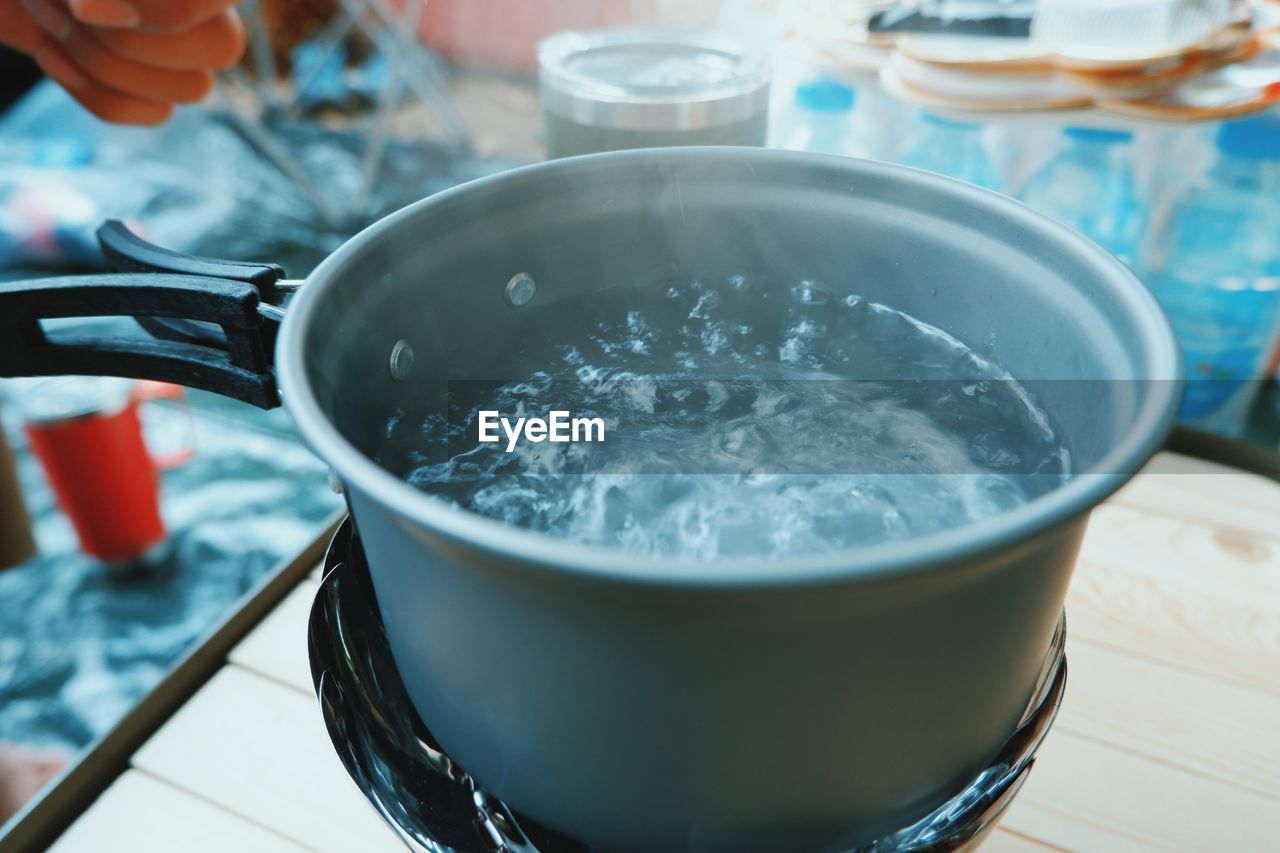 High angle view of person preparing food on table