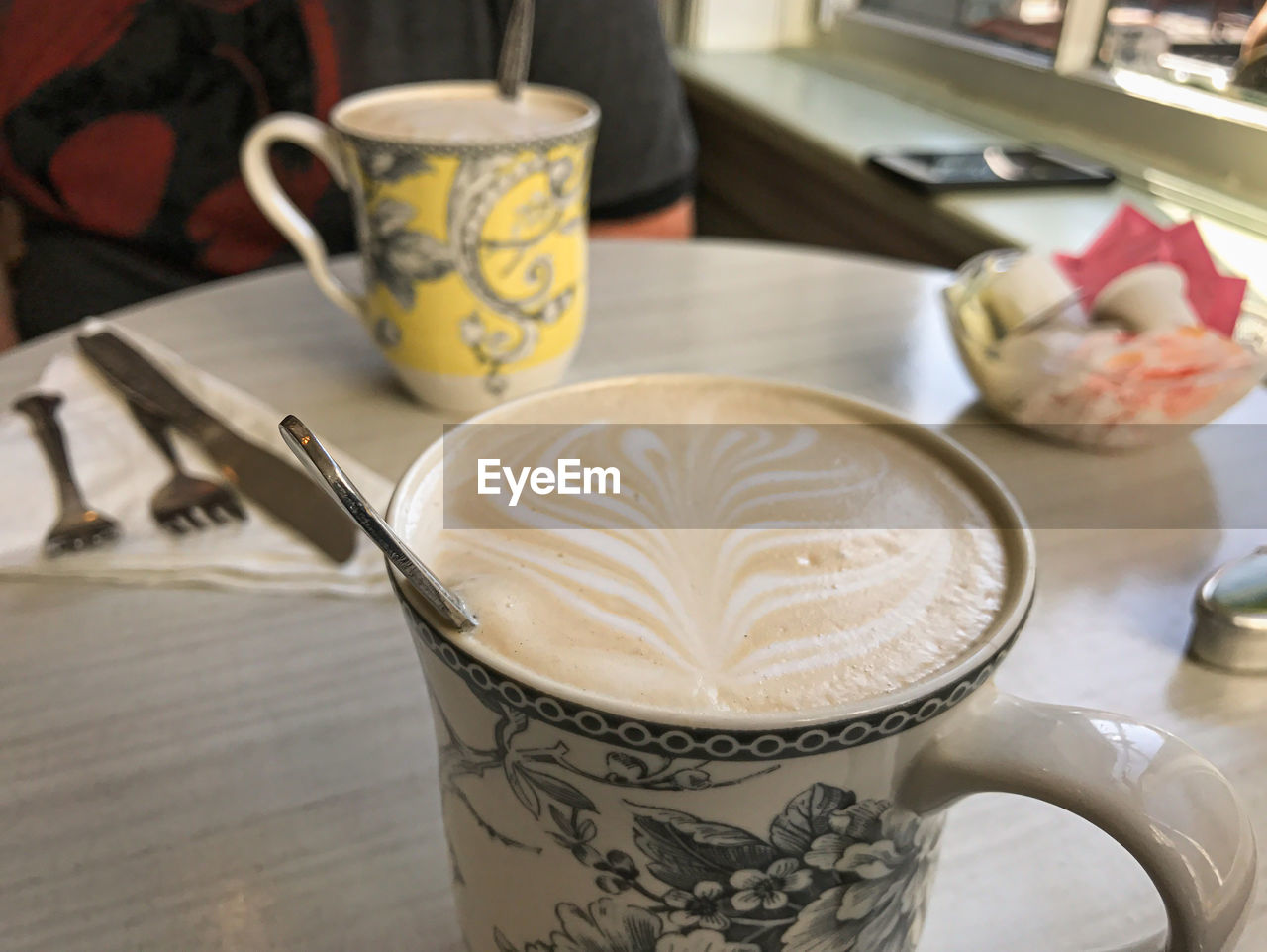 CLOSE-UP OF COFFEE SERVED ON TABLE AT HOME