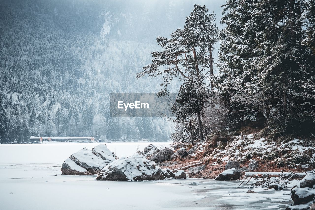 Scenic view of snow covered land during winter