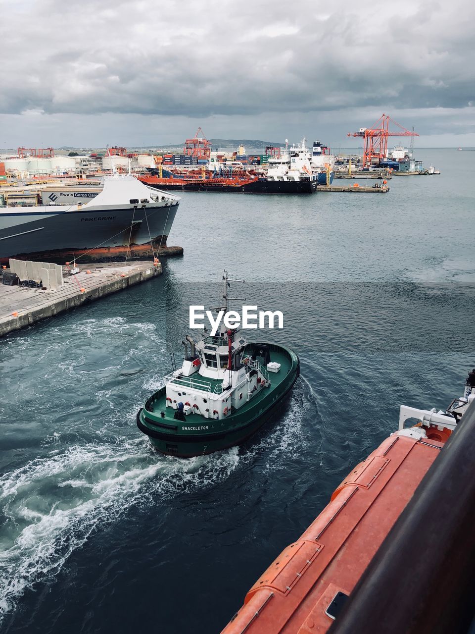 HIGH ANGLE VIEW OF SHIP ON SEA