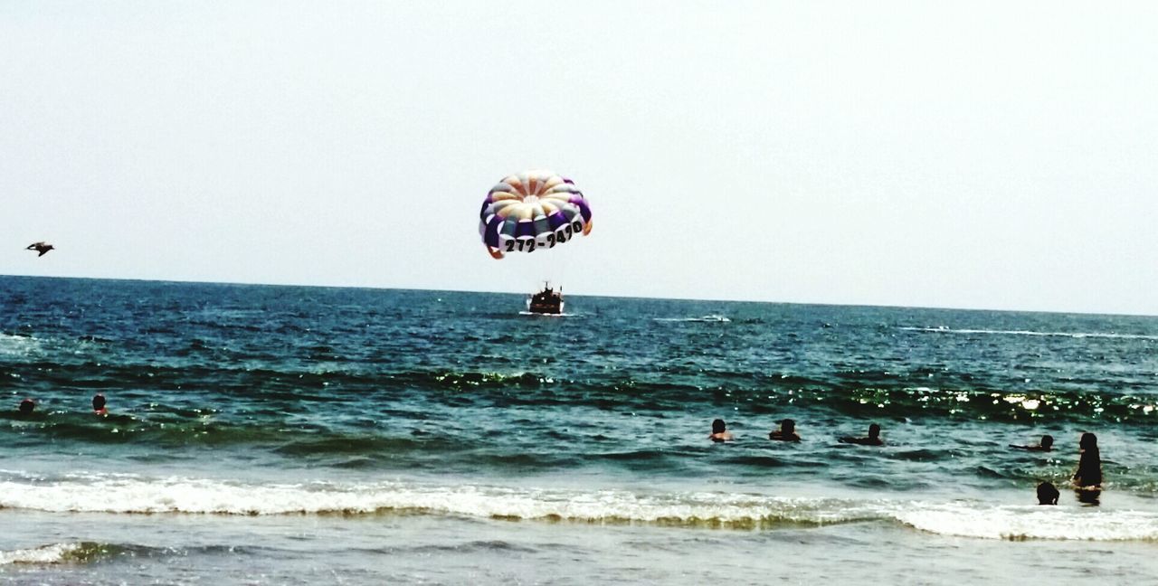 TOURISTS ON BEACH