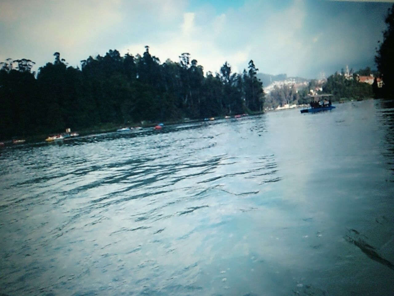 SCENIC VIEW OF BOATS IN SEA