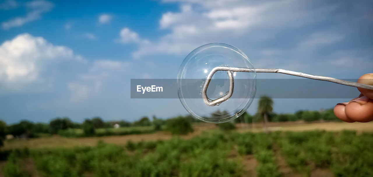 Soap bubble image, blue sky background