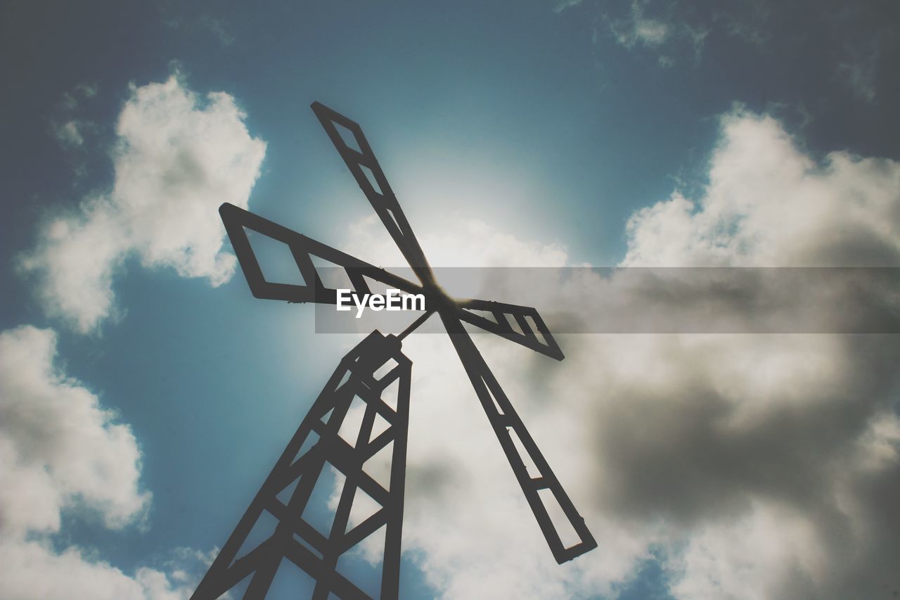 LOW ANGLE VIEW OF COMMUNICATIONS TOWER AGAINST SKY