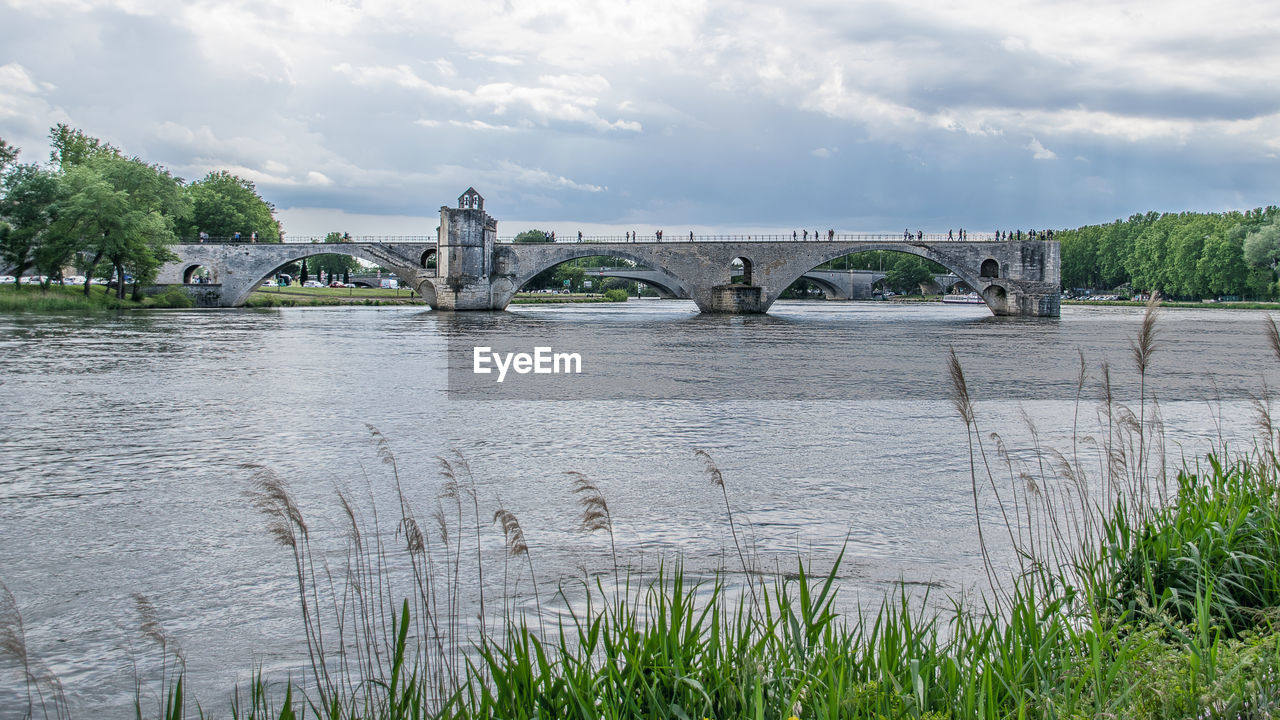 VIEW OF BRIDGE OVER RIVER AGAINST SKY