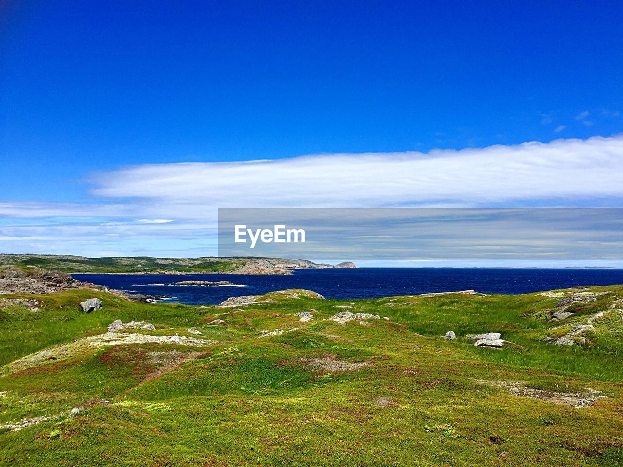 SCENIC VIEW OF SEA AGAINST BLUE SKY