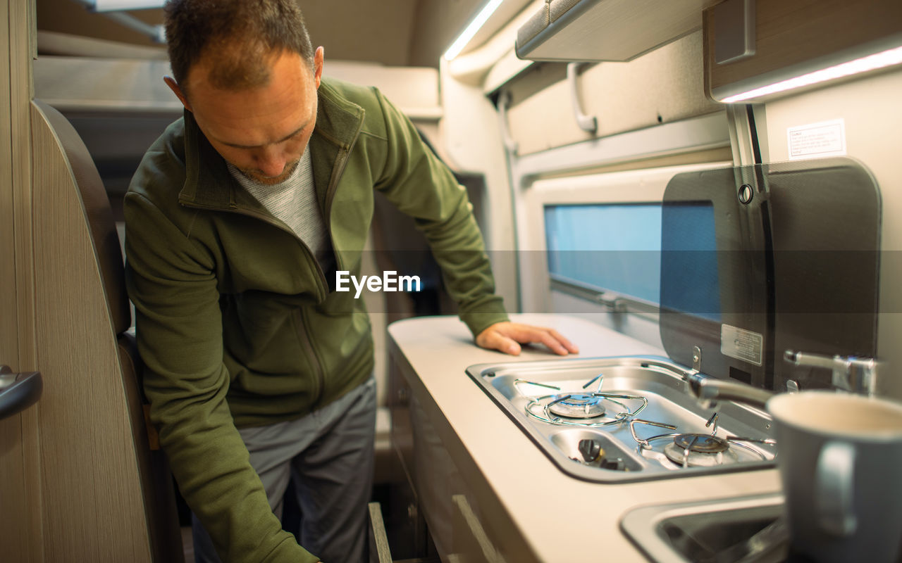 Man working in kitchen