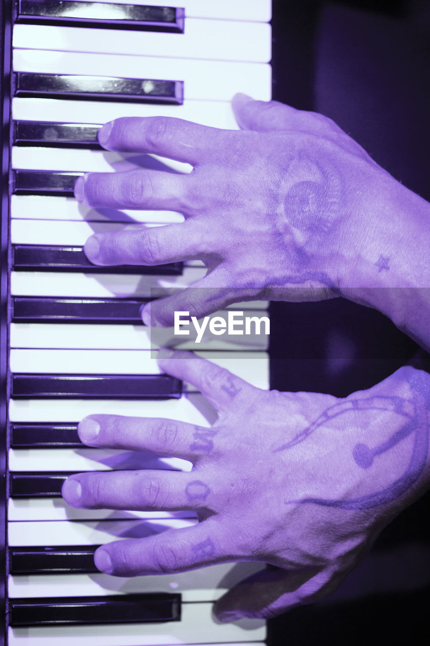 hand, purple, blue, one person, indoors, piano, adult, musical instrument, finger, close-up, holding