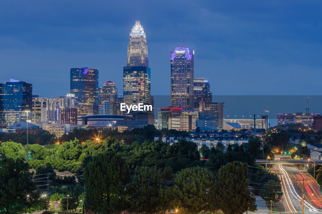 Illuminated buildings in city against sky at night ,downtown charlotte north carolina