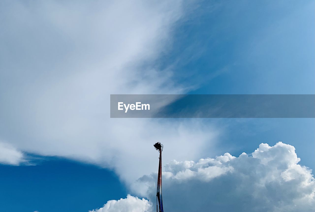 LOW ANGLE VIEW OF STREET LIGHT AGAINST BLUE SKY