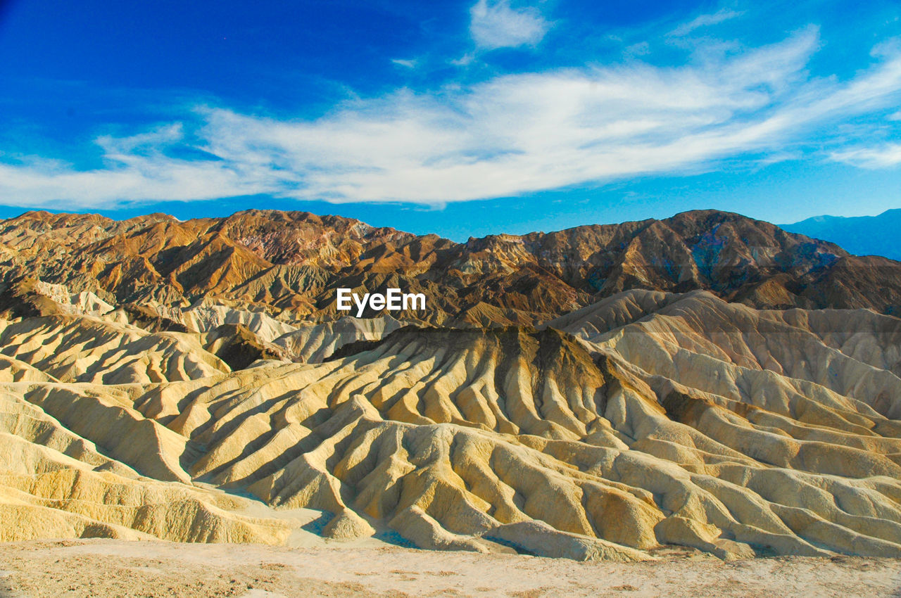 Scenic view of rocky mountains at zabriskie point in death valley national park