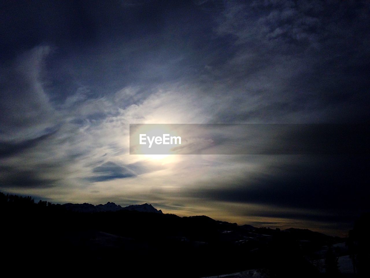 SILHOUETTE MOUNTAINS AGAINST SKY DURING SUNSET