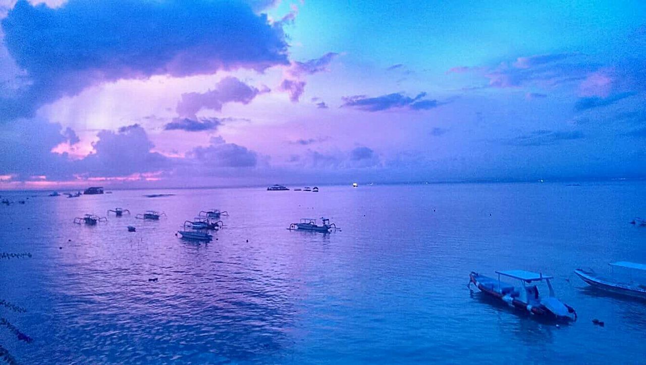 SCENIC VIEW OF SEA AT DUSK