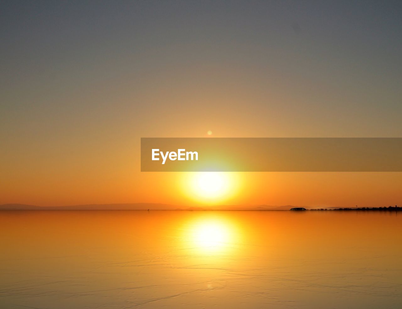 SUN SHINING OVER SEA