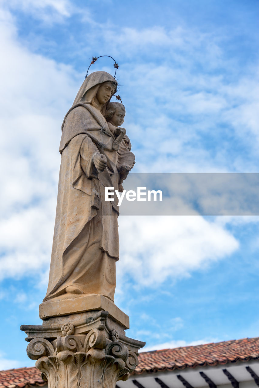 Low angle view of virgin mary statue