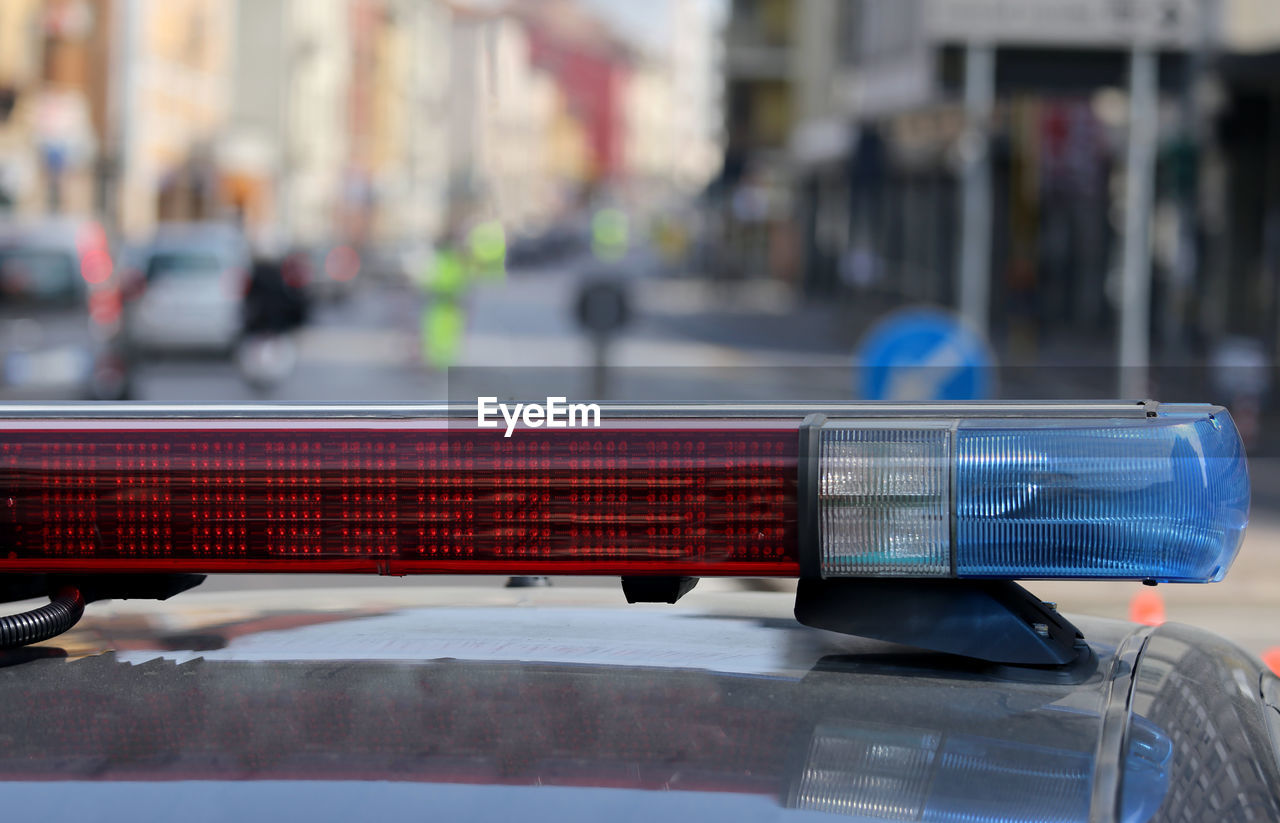 Close-up of lighting equipment on car in city