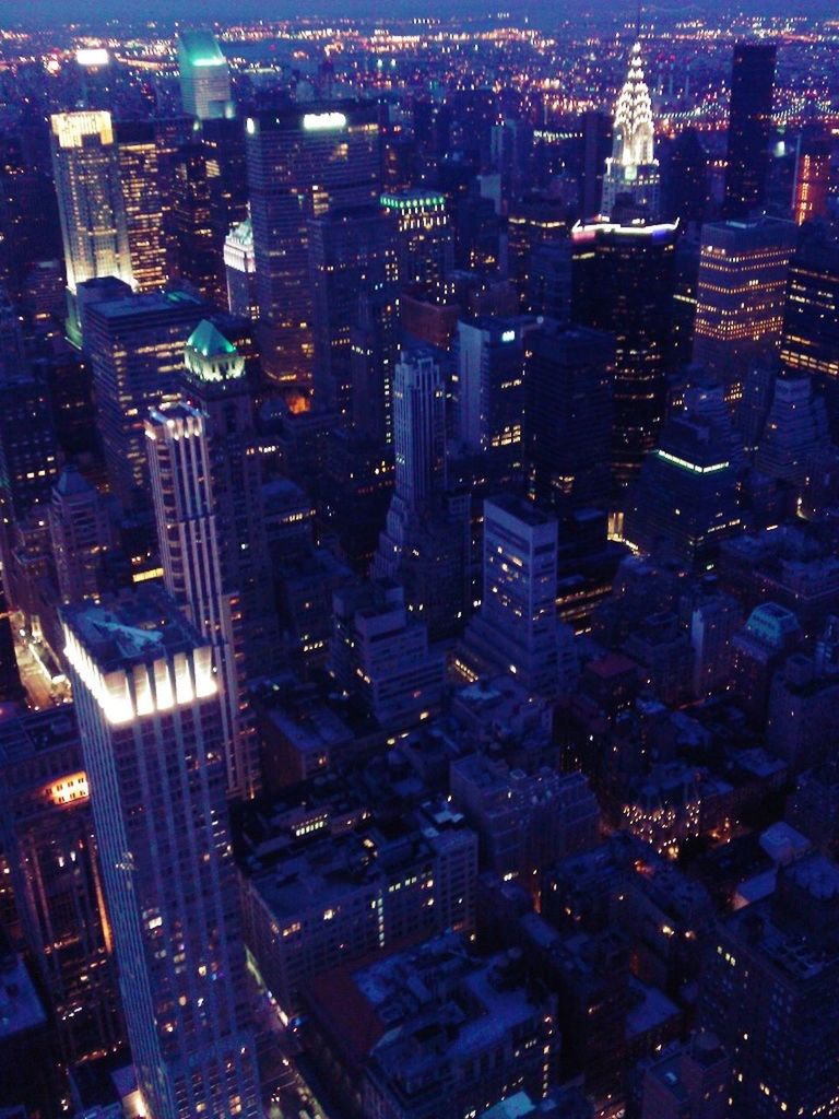 ILLUMINATED CITYSCAPE AT NIGHT