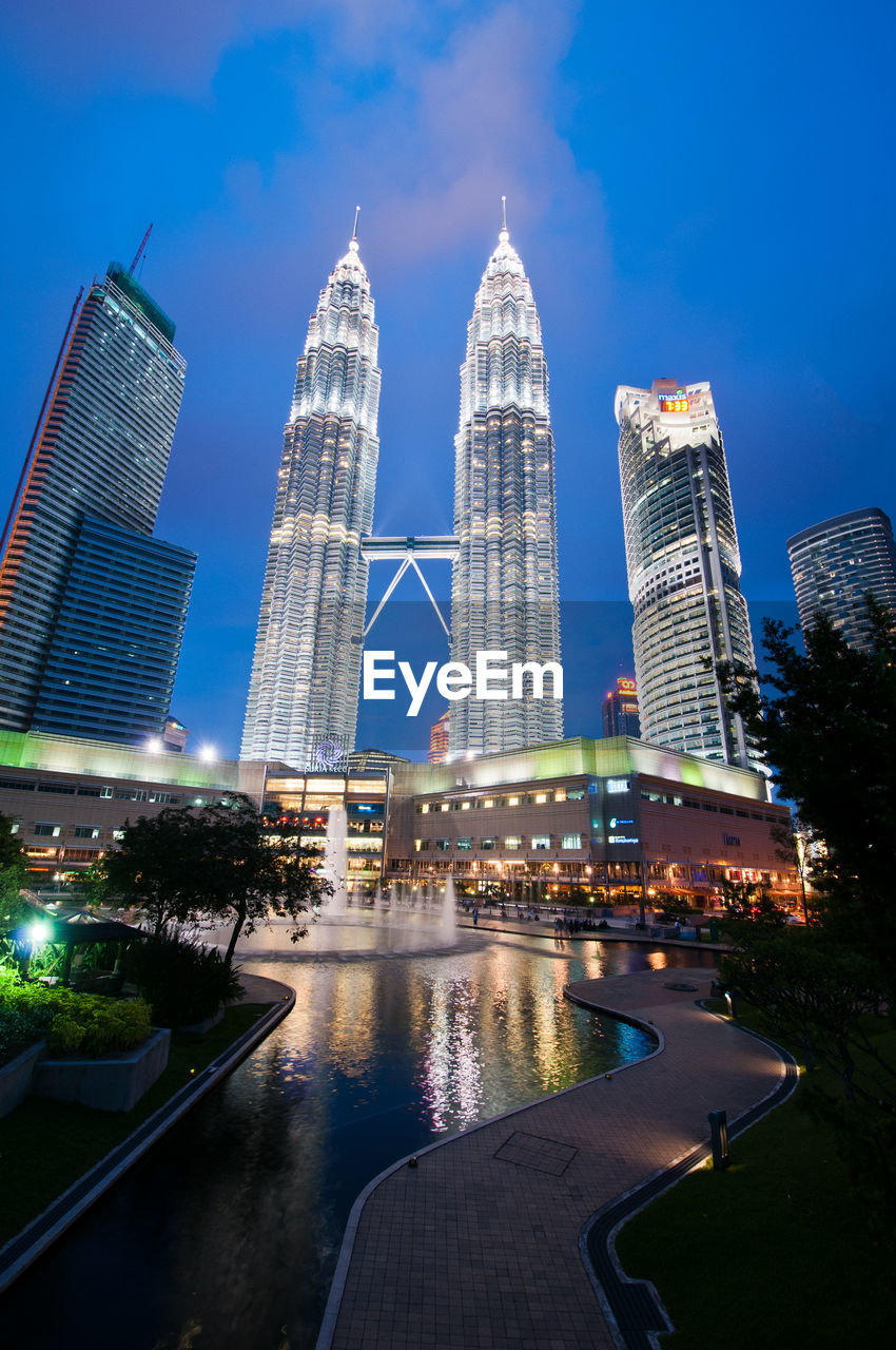 Low angle view of illuminated skyscrapers