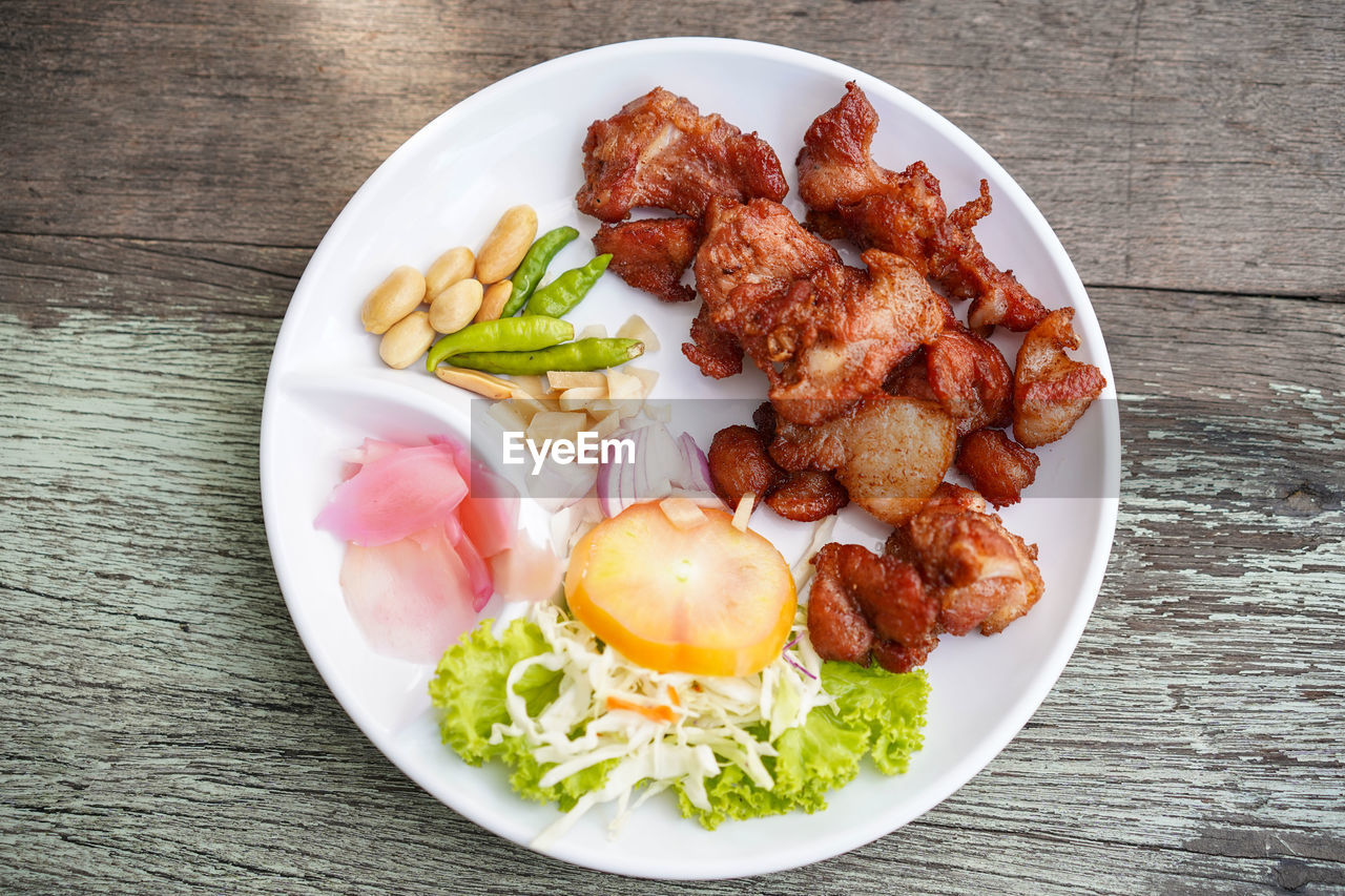 CLOSE-UP OF MEAL SERVED ON TABLE