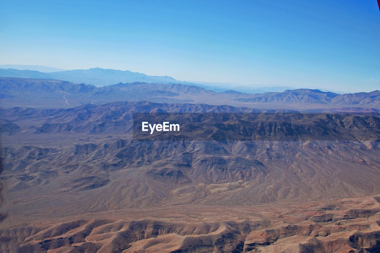 Scenic view of dramatic landscape against clear sky