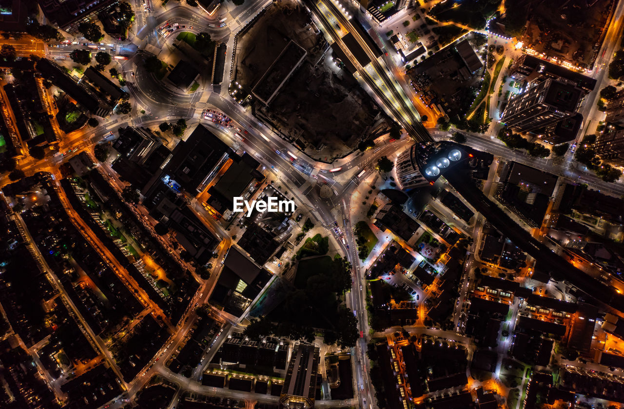 AERIAL VIEW OF ILLUMINATED CITY BUILDINGS