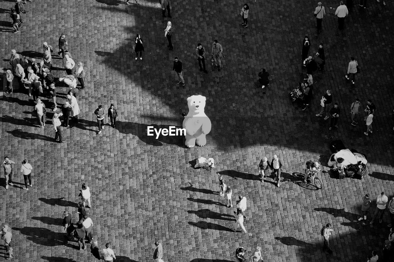 High angle view of people on street in city