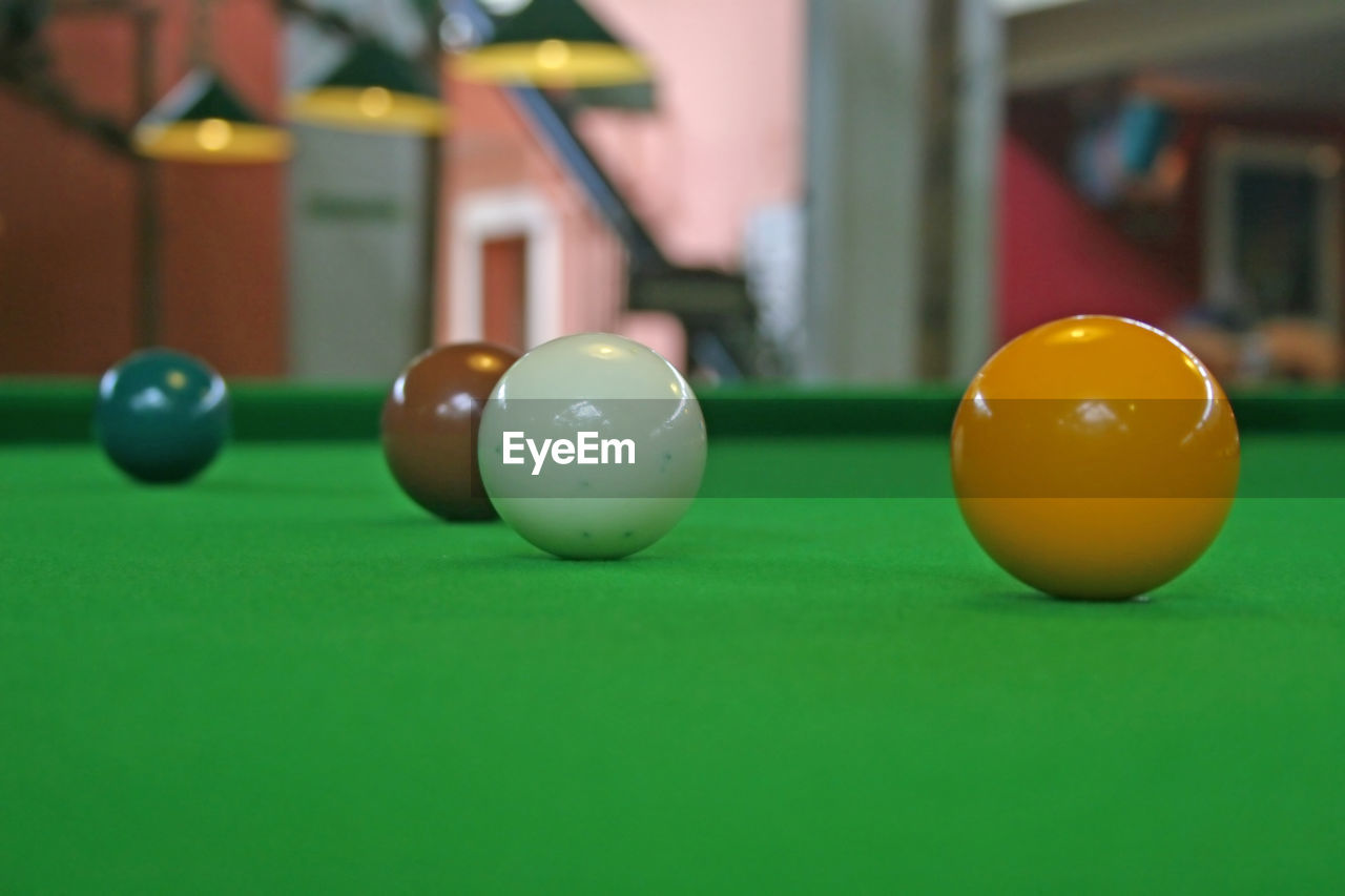 Close-up of pool balls on table