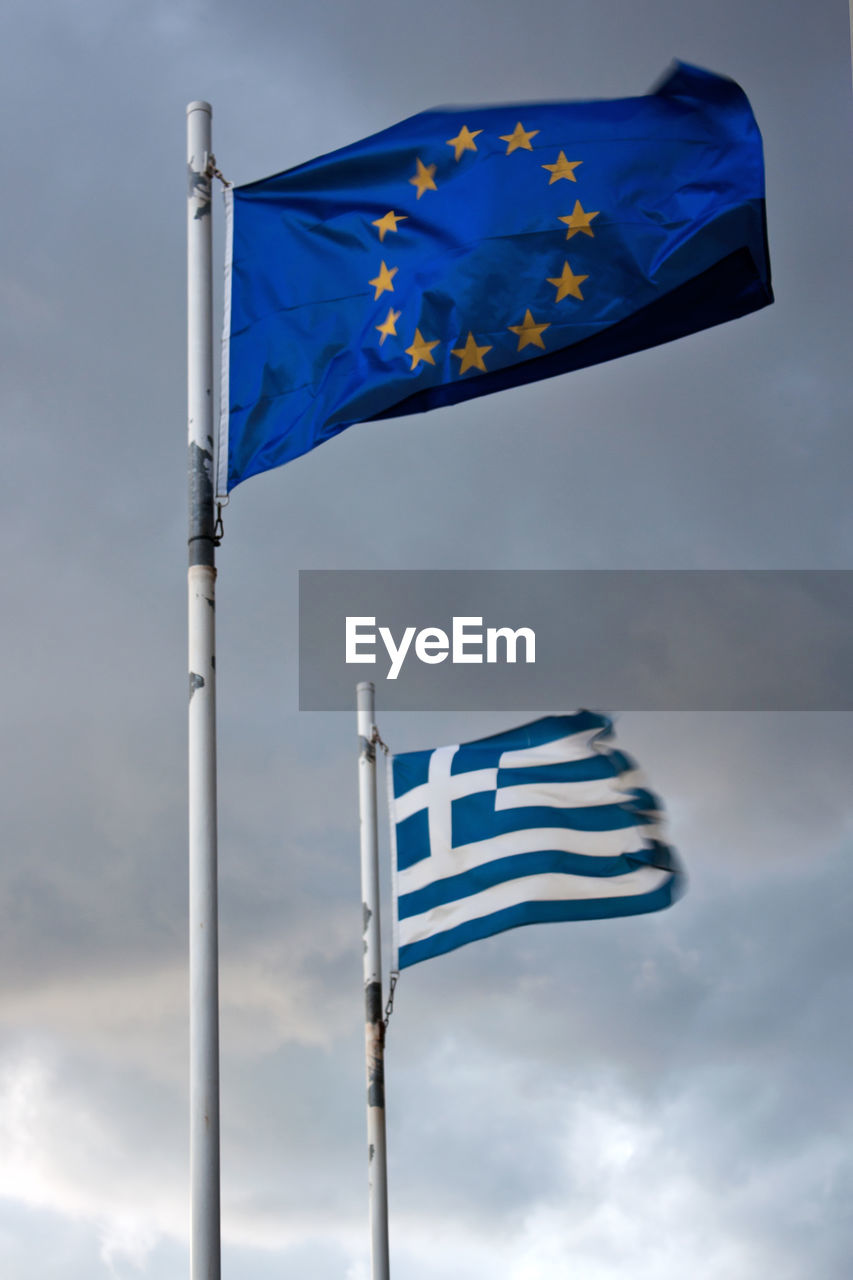 LOW ANGLE VIEW OF FLAG AGAINST SKY