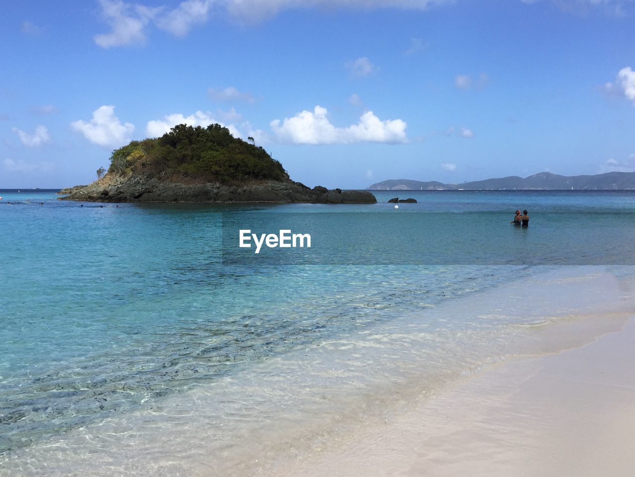 Scenic view of sea against blue sky