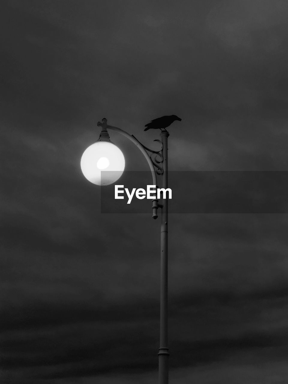 Low angle view of street light against sky