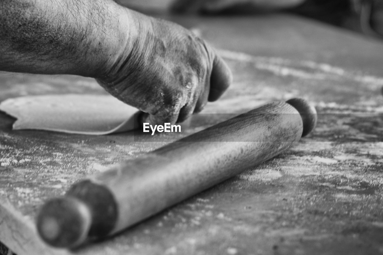 Close-up of hand making food