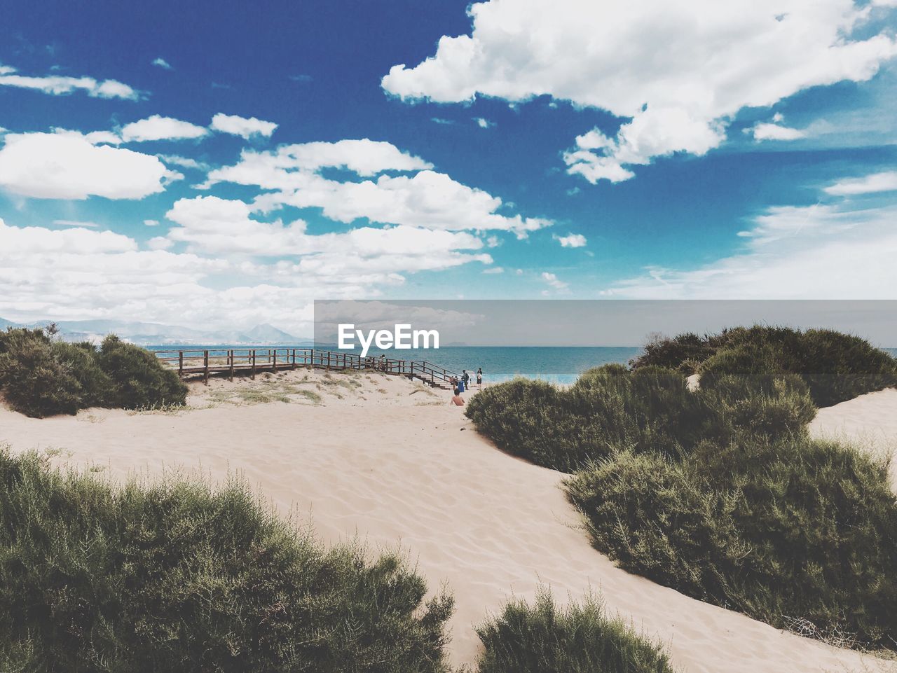 View of calm beach against the sky