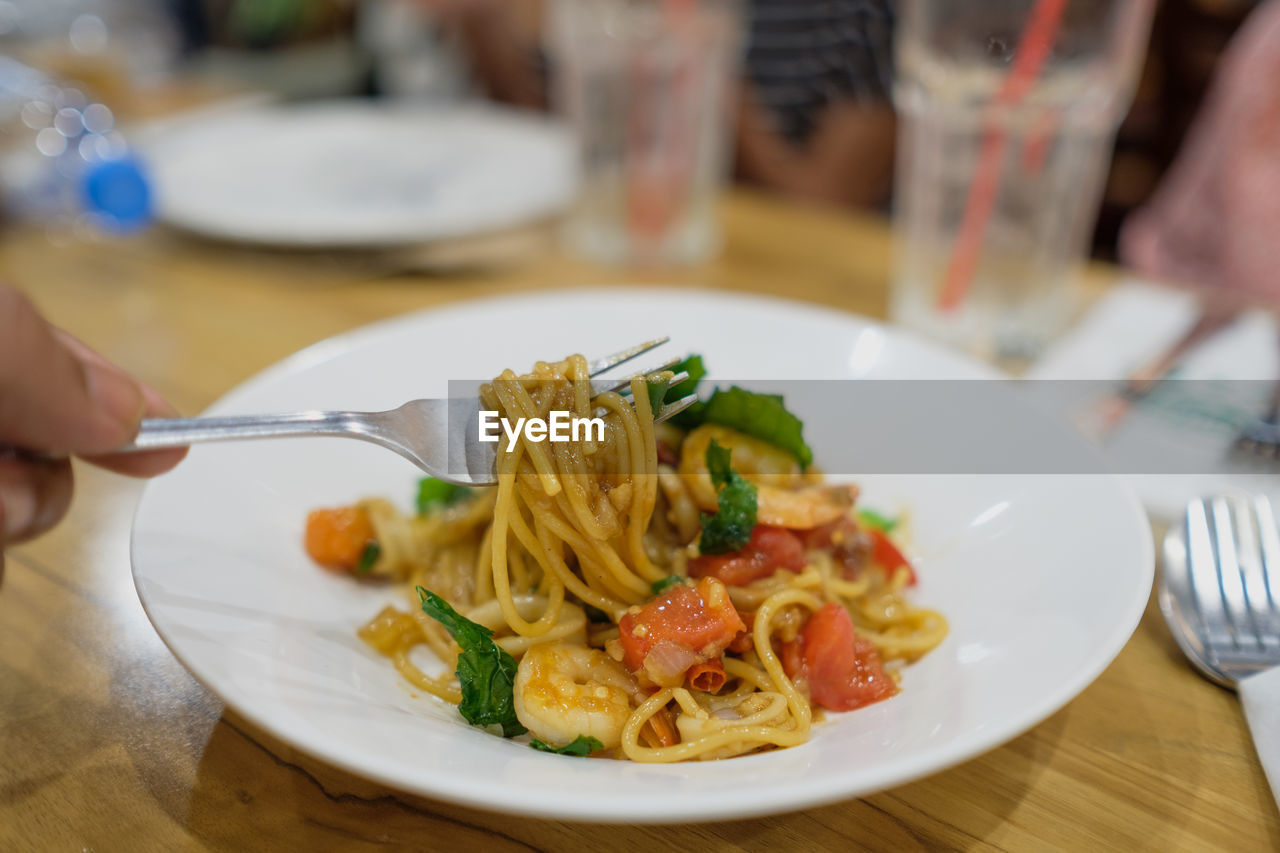 Close-up of spaghetti served in plate