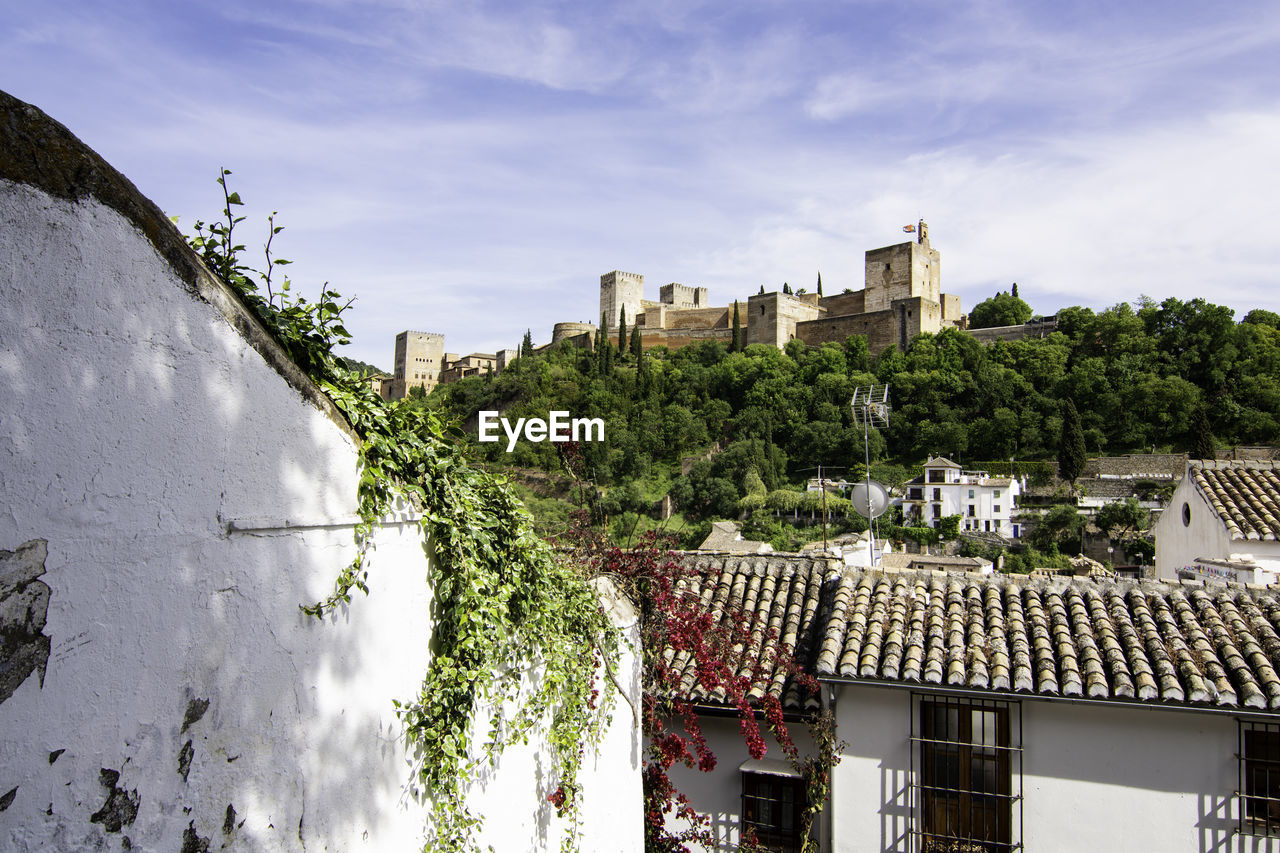 View of the alhambra from mirador de los carvajales - granada, spain