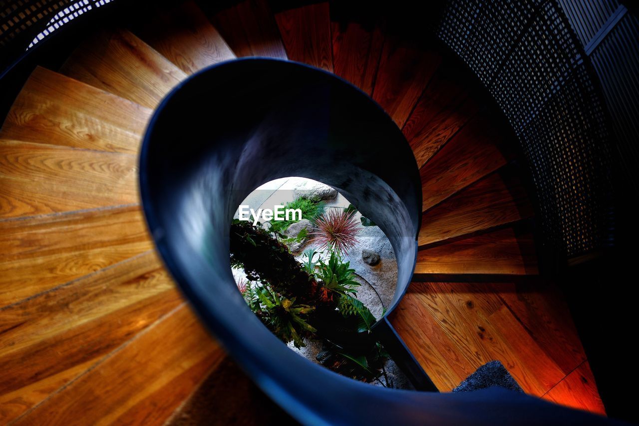 High angle view of spiral wooden staircase