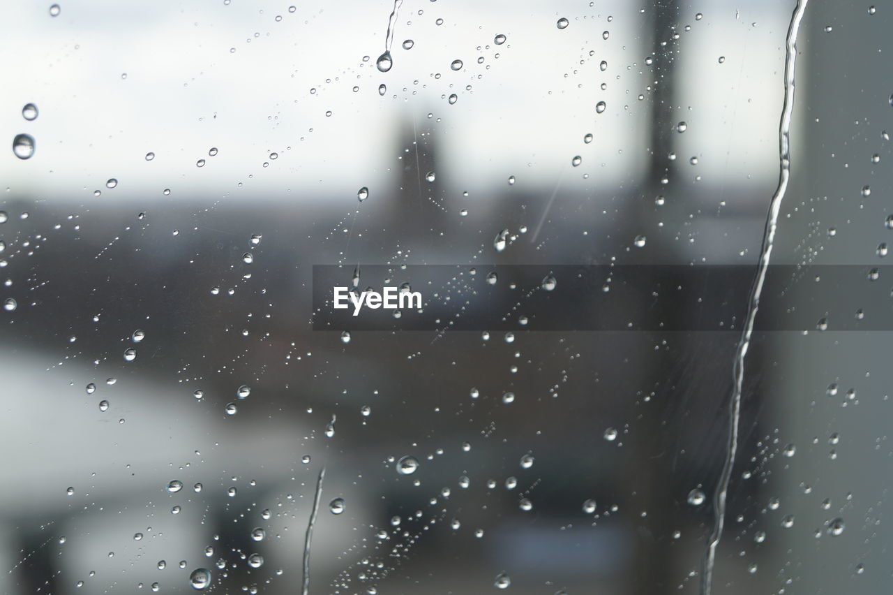 WATER DROPS ON GLASS