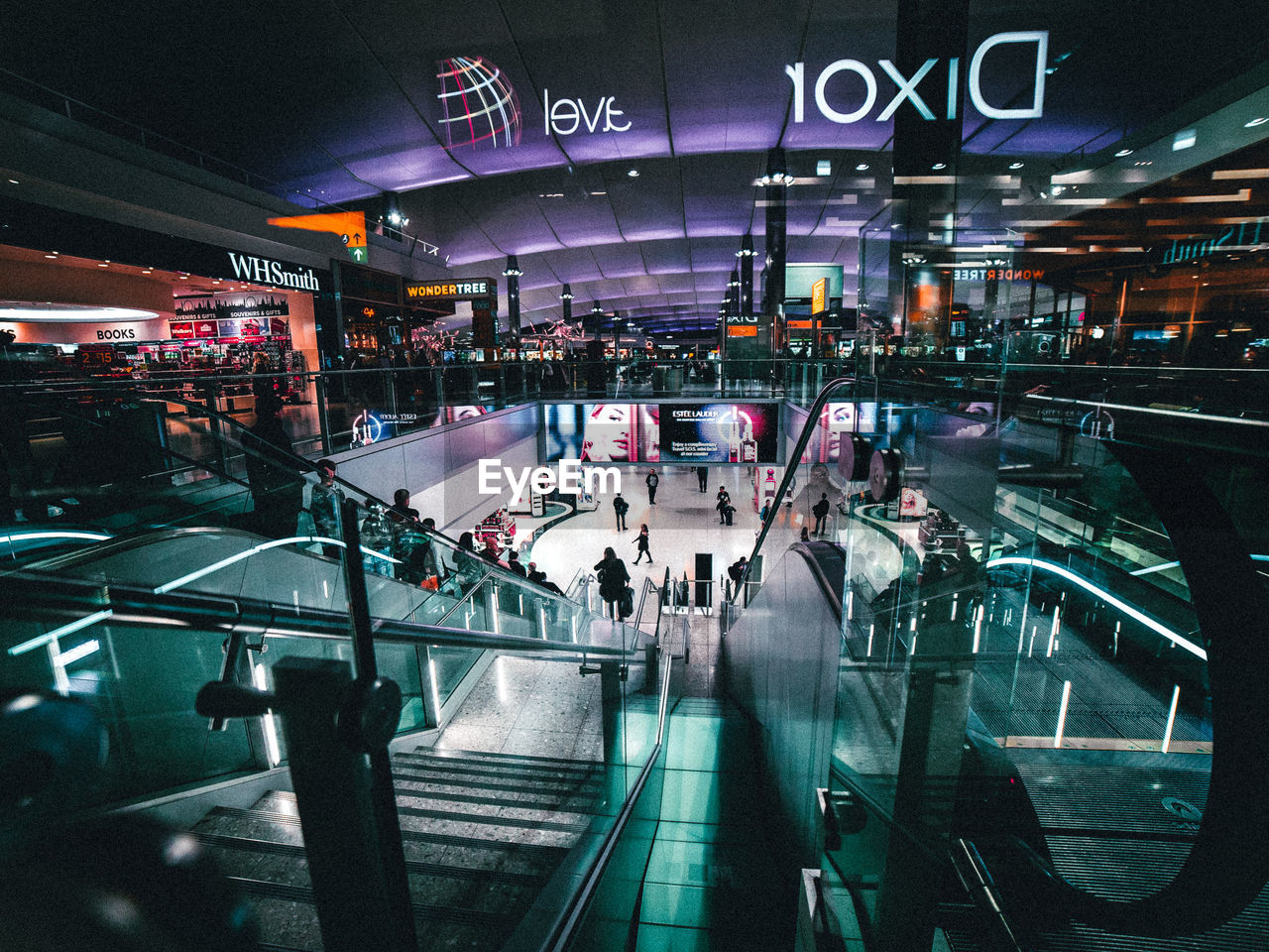 HIGH ANGLE VIEW OF CROWD AT ILLUMINATED CITY