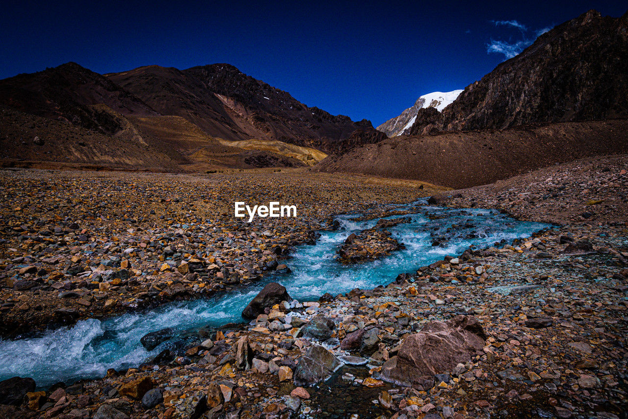 scenic view of rocky mountains against sky