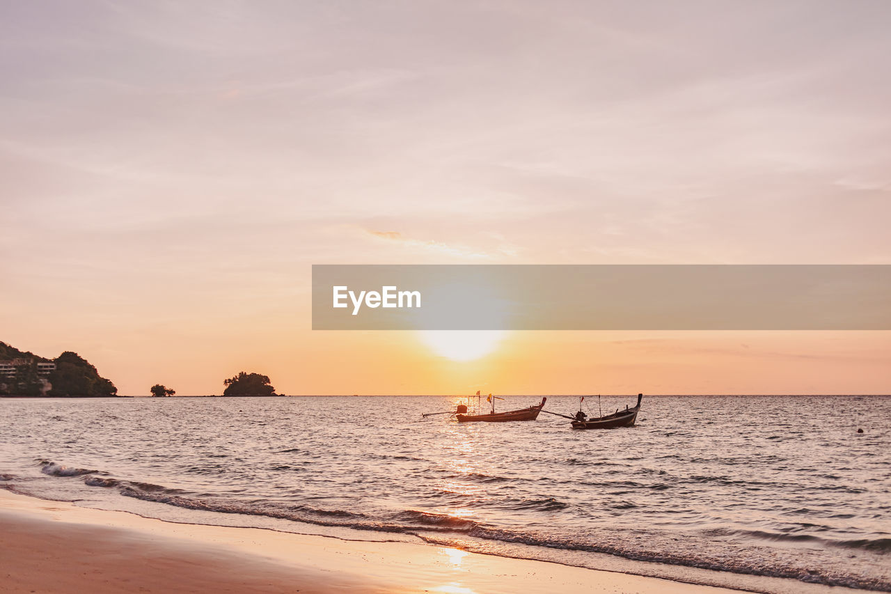 scenic view of sea against sky at sunset