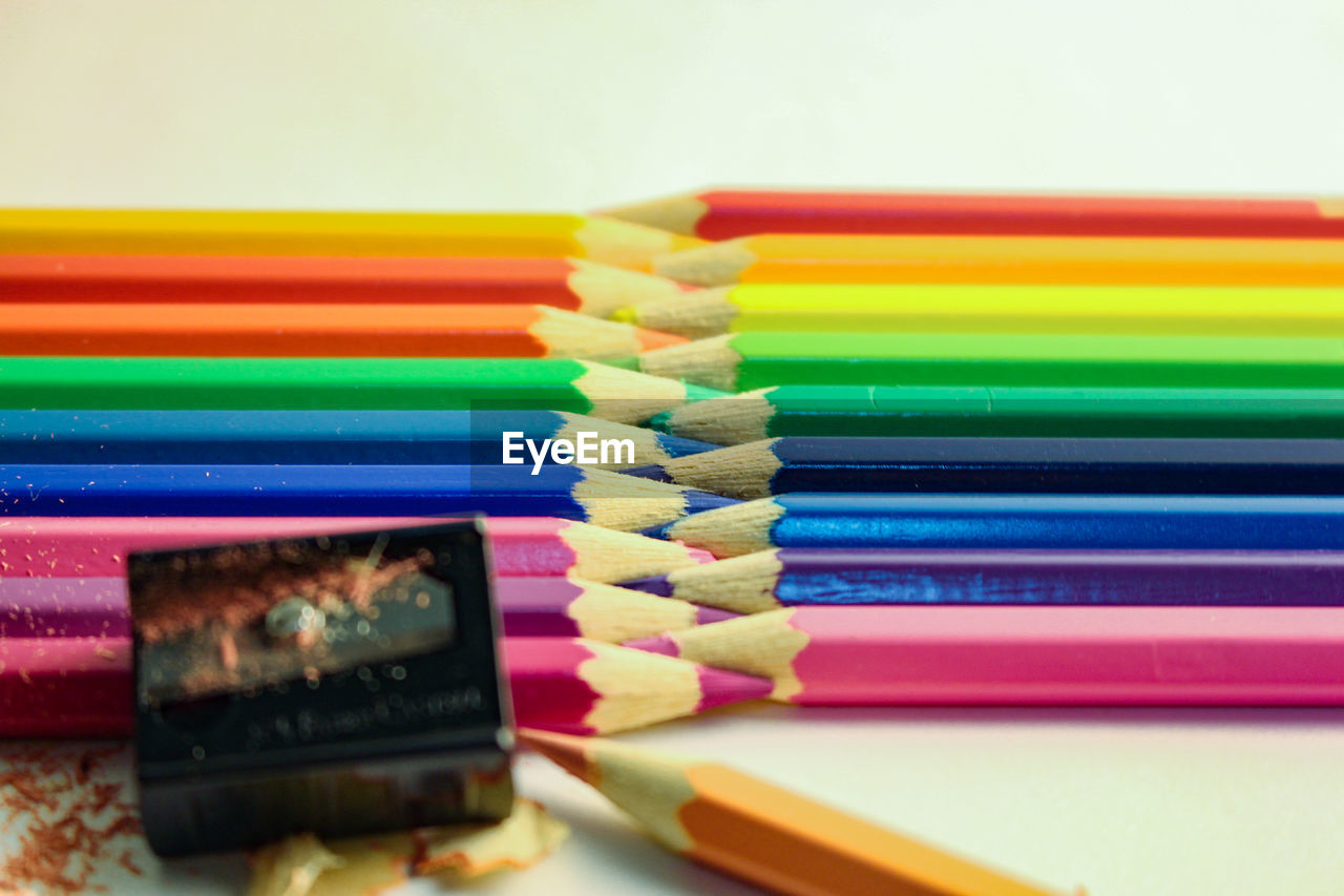 Close-up of colored pencils on table