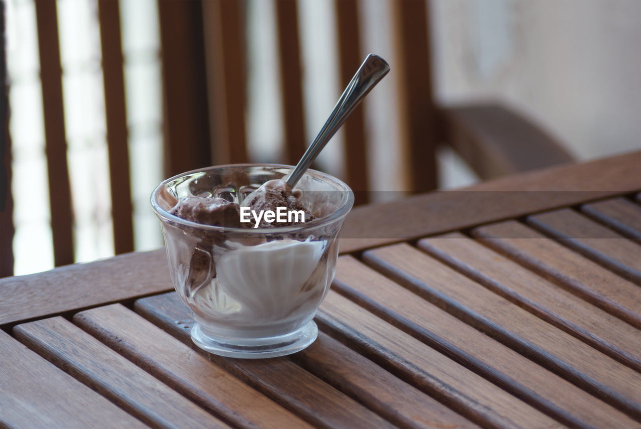 Close-up of icecream in glass on table