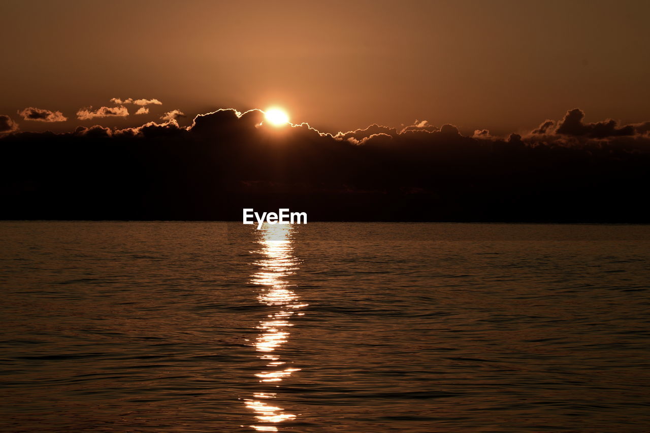 VIEW OF SEA AGAINST SKY DURING SUNSET