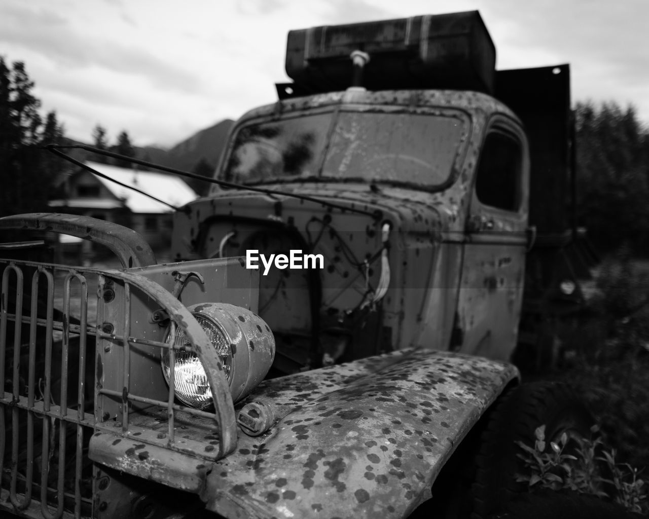 Abandoned truck against sky