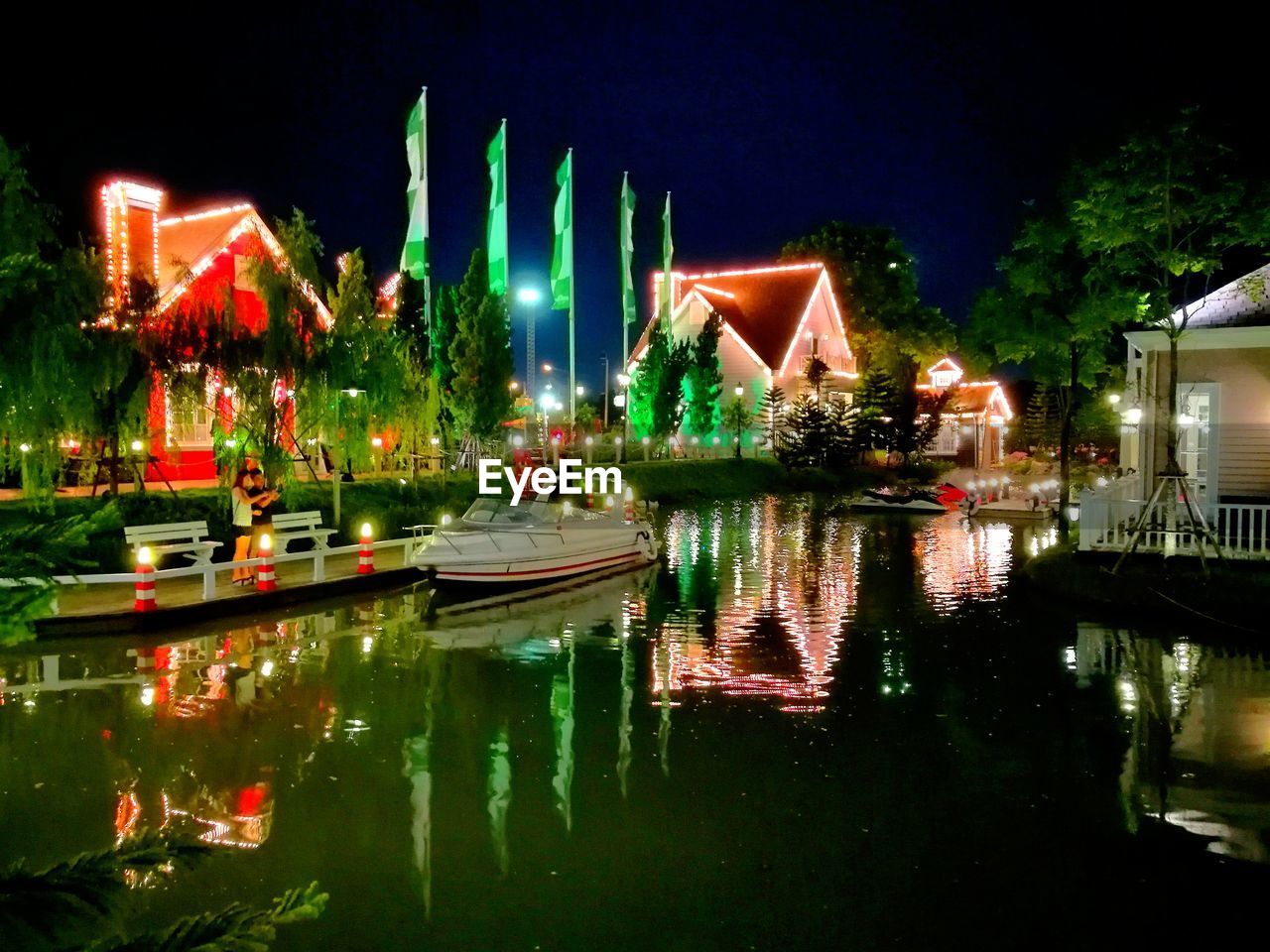 ILLUMINATED TRADITIONAL BUILDING AT NIGHT