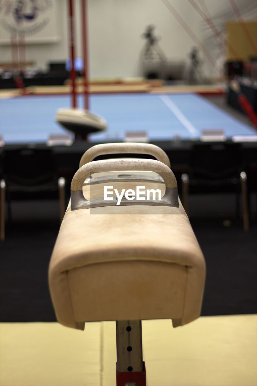 Close-up of pommel horse at gym