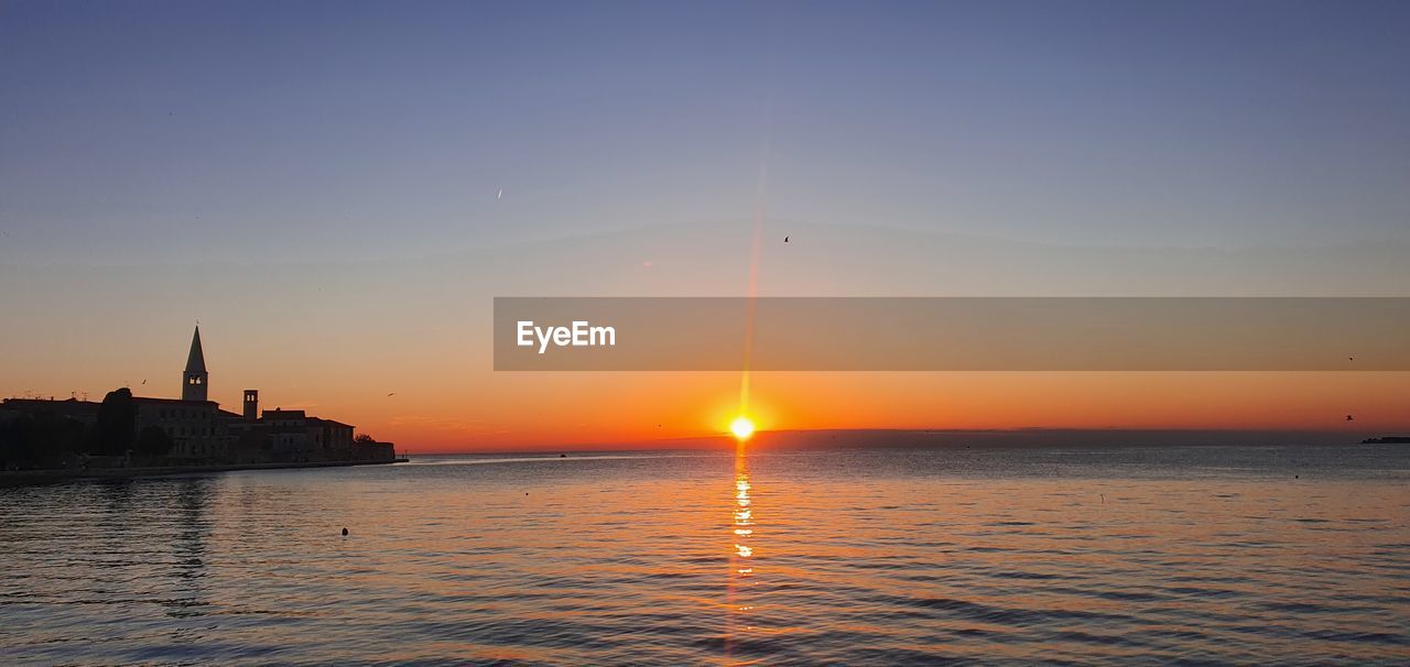 VIEW OF SEA AGAINST SKY DURING SUNSET